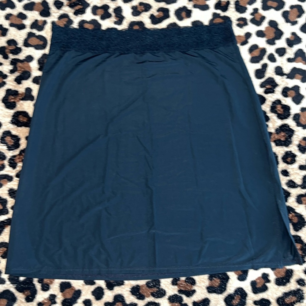 Jockey slip black w/lace trim on top and slit on bottom side size XS